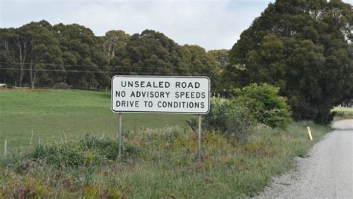 Whats the speed limit on unmarked country roads?